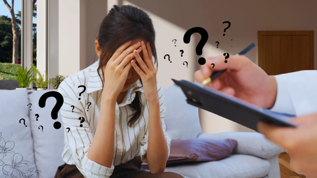Worried woman in therapy, surrounded by question marks symbolizing anxiety.