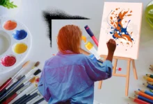 Woman painting abstract art on a canvas